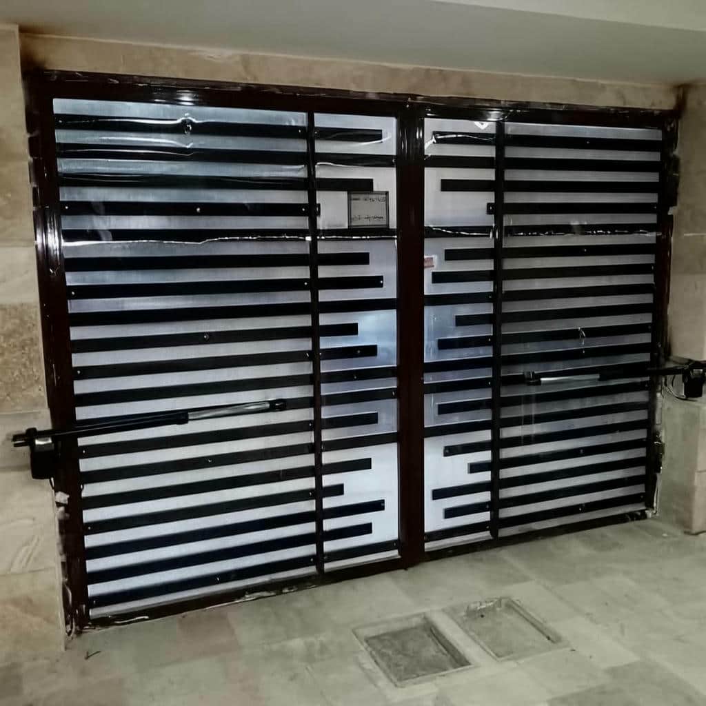 قیمت جک درب پارکینگ اتوماتیک ریلی در بیرجند
