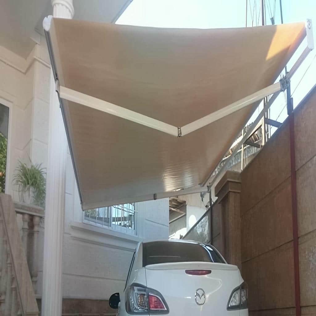 کارخانه سایبان برقی بازویی اتوماتیک سازه فلزی در یزد