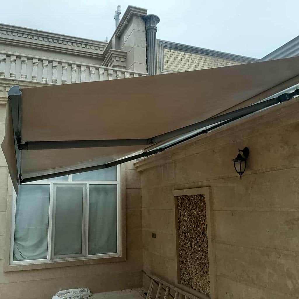 نصب سایبان برقی بازویی اتوماتیک موتور هماهنگ در بابل