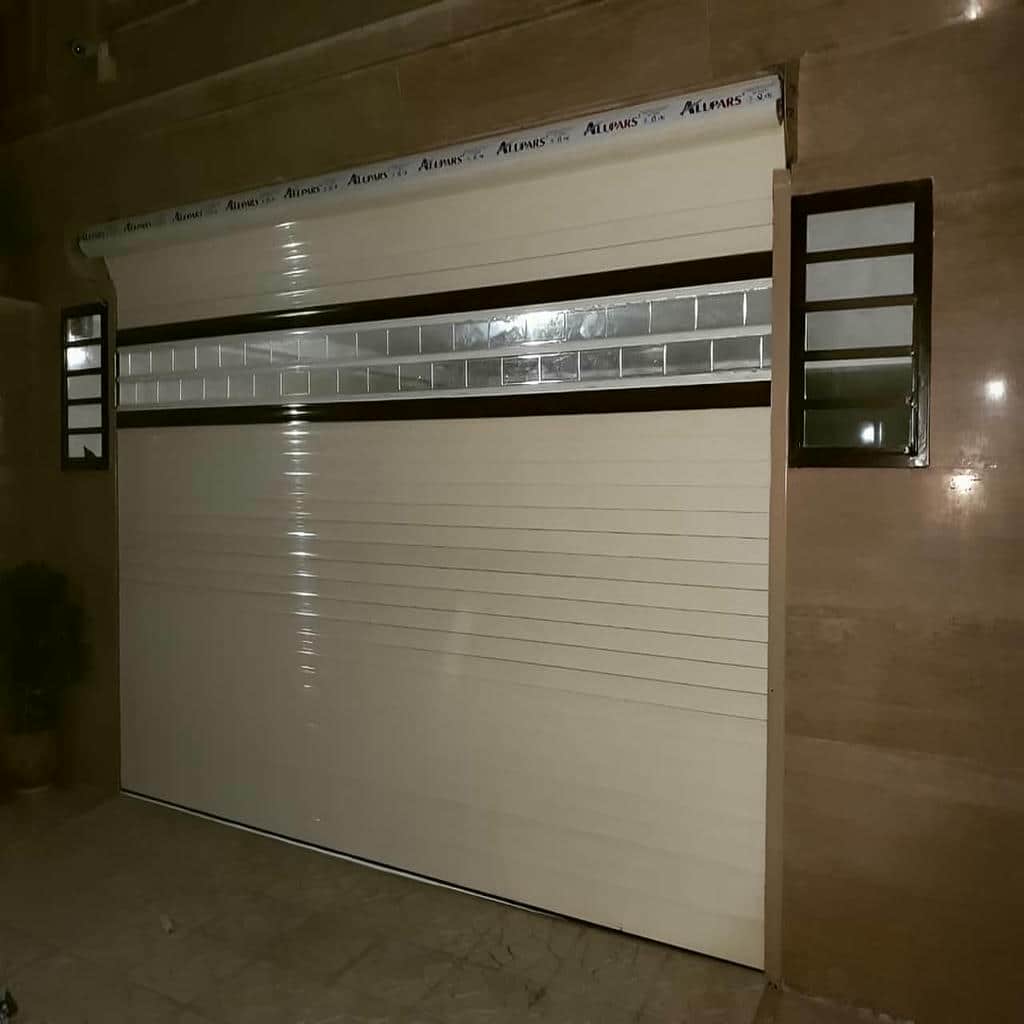 فروش کرکره برقی پارکینگ و مغازه با موتور توبلار در کردان