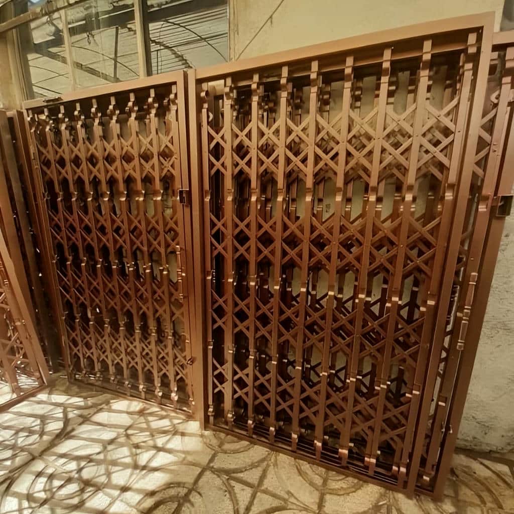 فروش درب آکاردئونی فلزی ضدسرقت تمام گل در کمال شهر