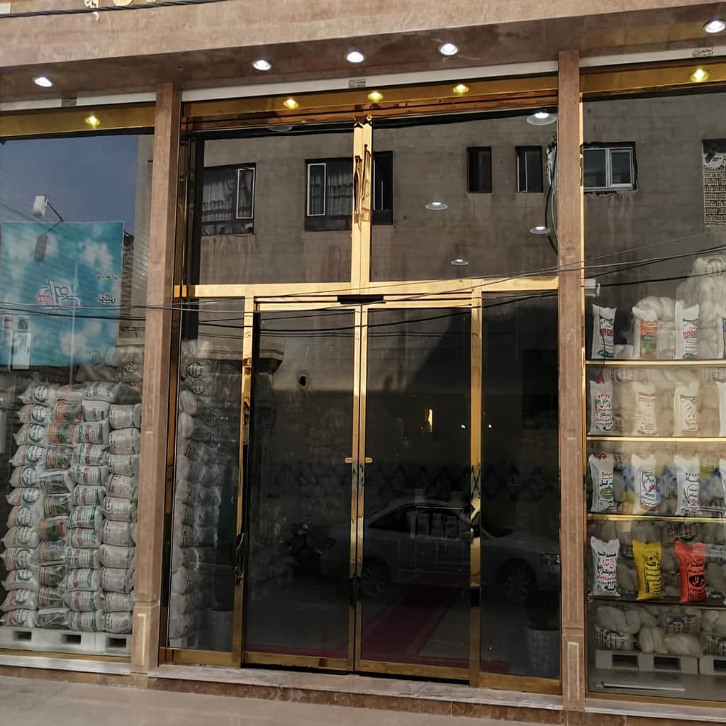نصب درب شیشه ای اتوماتیک با اپراتور کم صدا