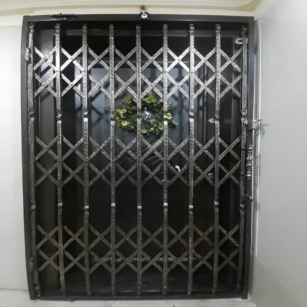 حفاظ آکاردئونی درب آپارتمان با طرح لوزی