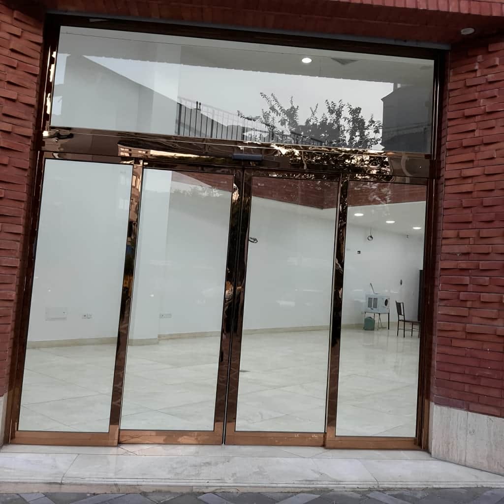 درب اتوماتیک شیشه ای لوکس هتلینگ با ریل بالایی روان