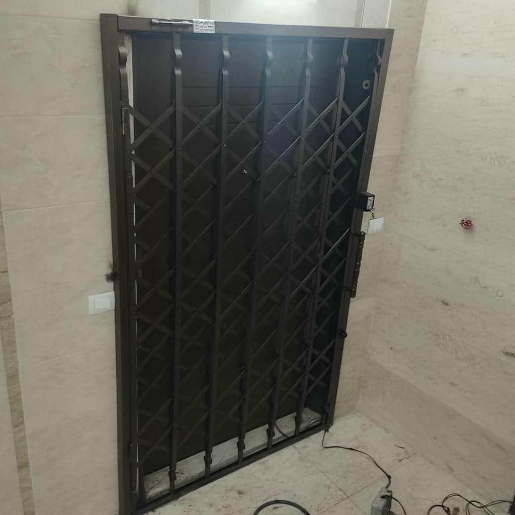 حفاظ درب آکاردئونی با تسمه مقاوم برای ورودی مسکونی در استان البرز