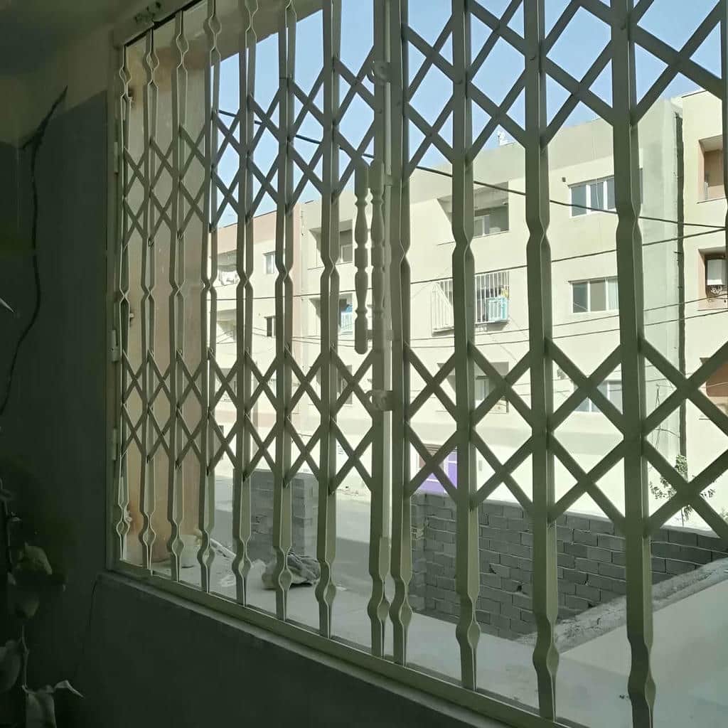 حفاظ درب آکاردئونی جمع شونده مناسب فضای پاگرد در استان کردستان