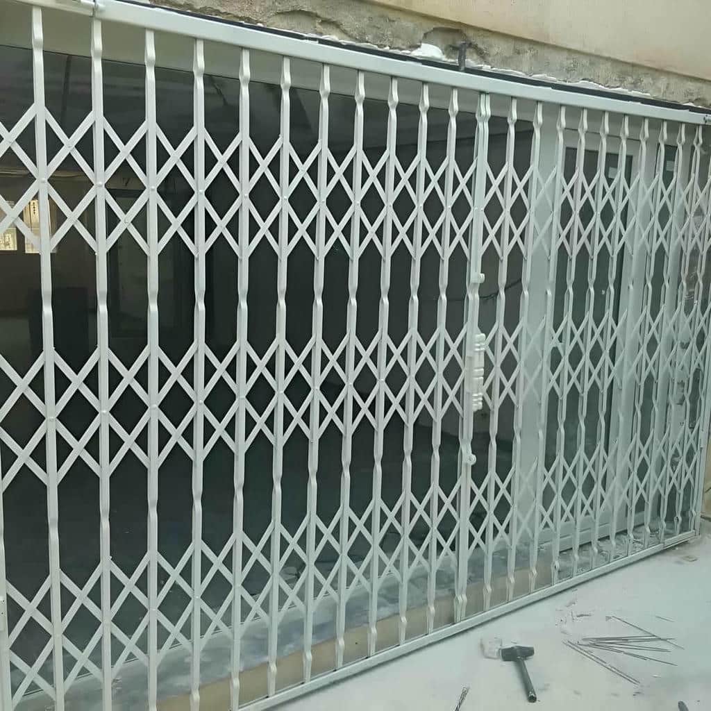 حفاظ درب آکاردئونی جمع شونده مناسب فضای پاگرد در تبریز