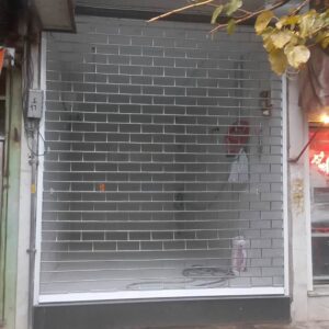 کرکره برقی کم صدا در ورودی ساختمان مسکونی