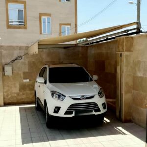 سایبان برقی مدل بازویی برای ورودی ساختمان قدیمی در ایلام