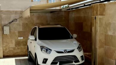 سایبان برقی مدل بازویی برای ورودی ساختمان قدیمی در ایلام