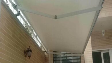سایبان برقی با پارچه روشن هماهنگ با نما در استان اردبیل