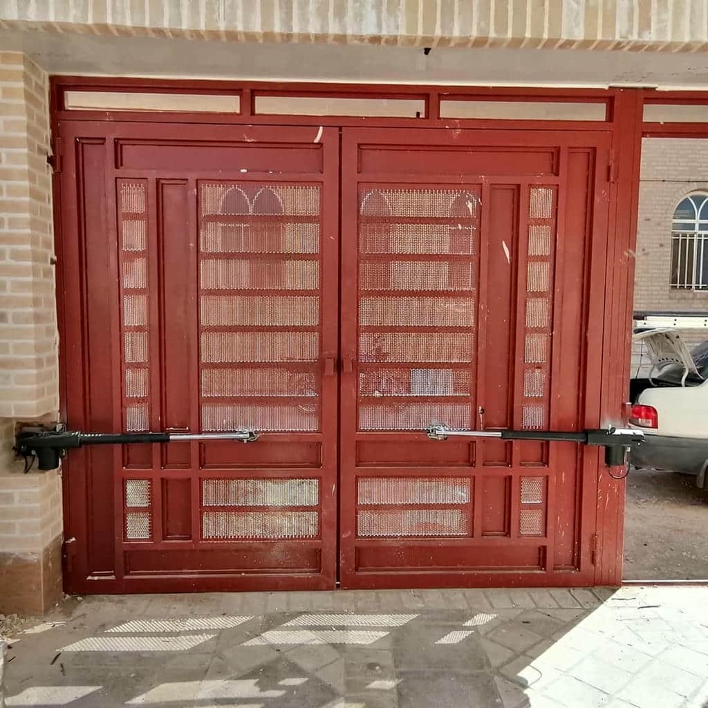 جک درب پارکینگ در استان تهران نصب شده روی ورودی مجتمع مسکونی جک درب پارکینگ در استان تهران نصب شده روی ورودی مجتمع مسکونی