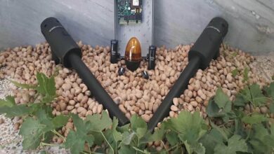 جک درب پارکینگ در استان ایلام با بازوی فلزی برای کنترل ورودی ساختمان